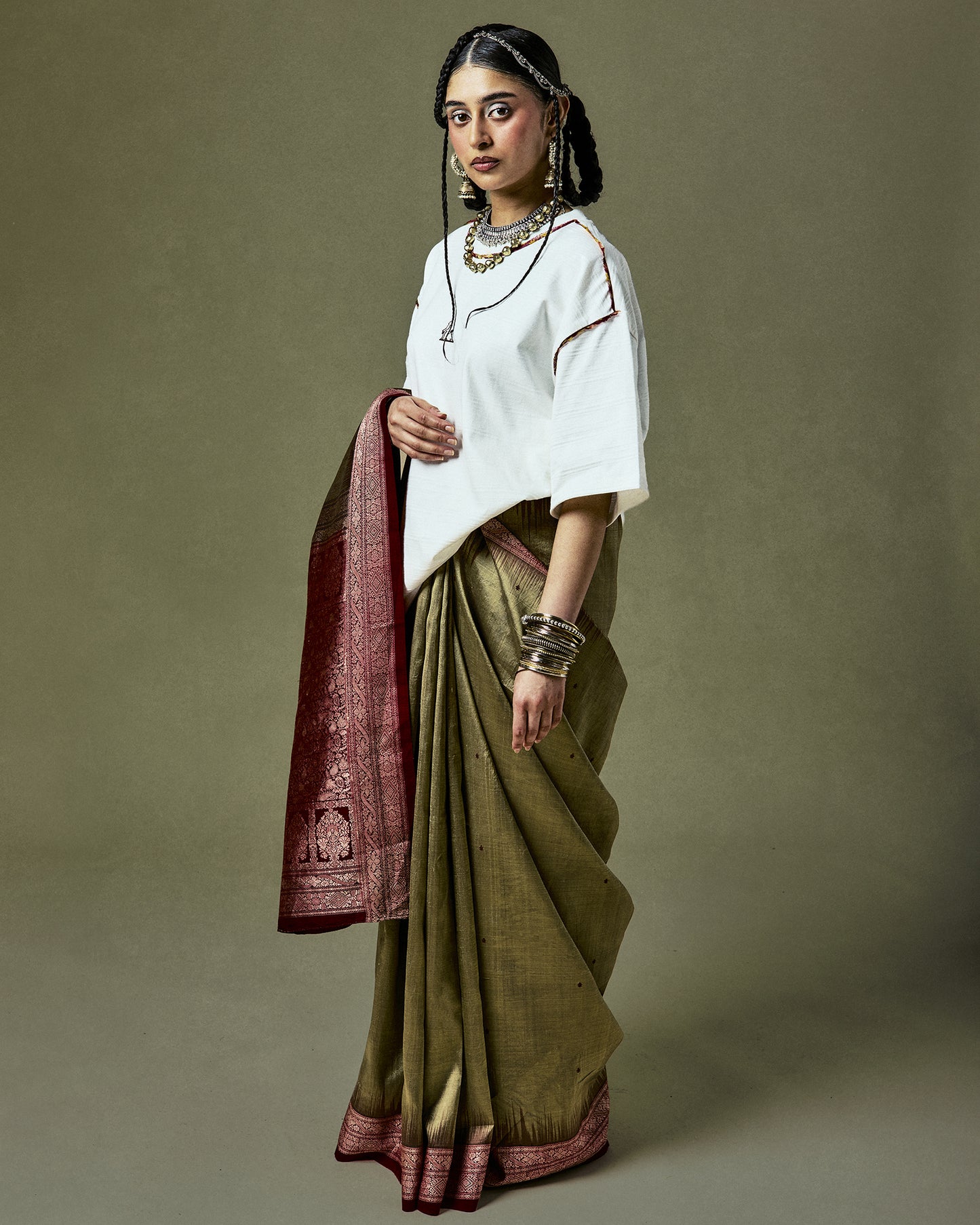 Stylish Quinto T-Shirt, incorporating vintage Mumbai sarees and showcasing a 'Calabria-Sicilia' odyssey - heritage meets fashion in an oversized design