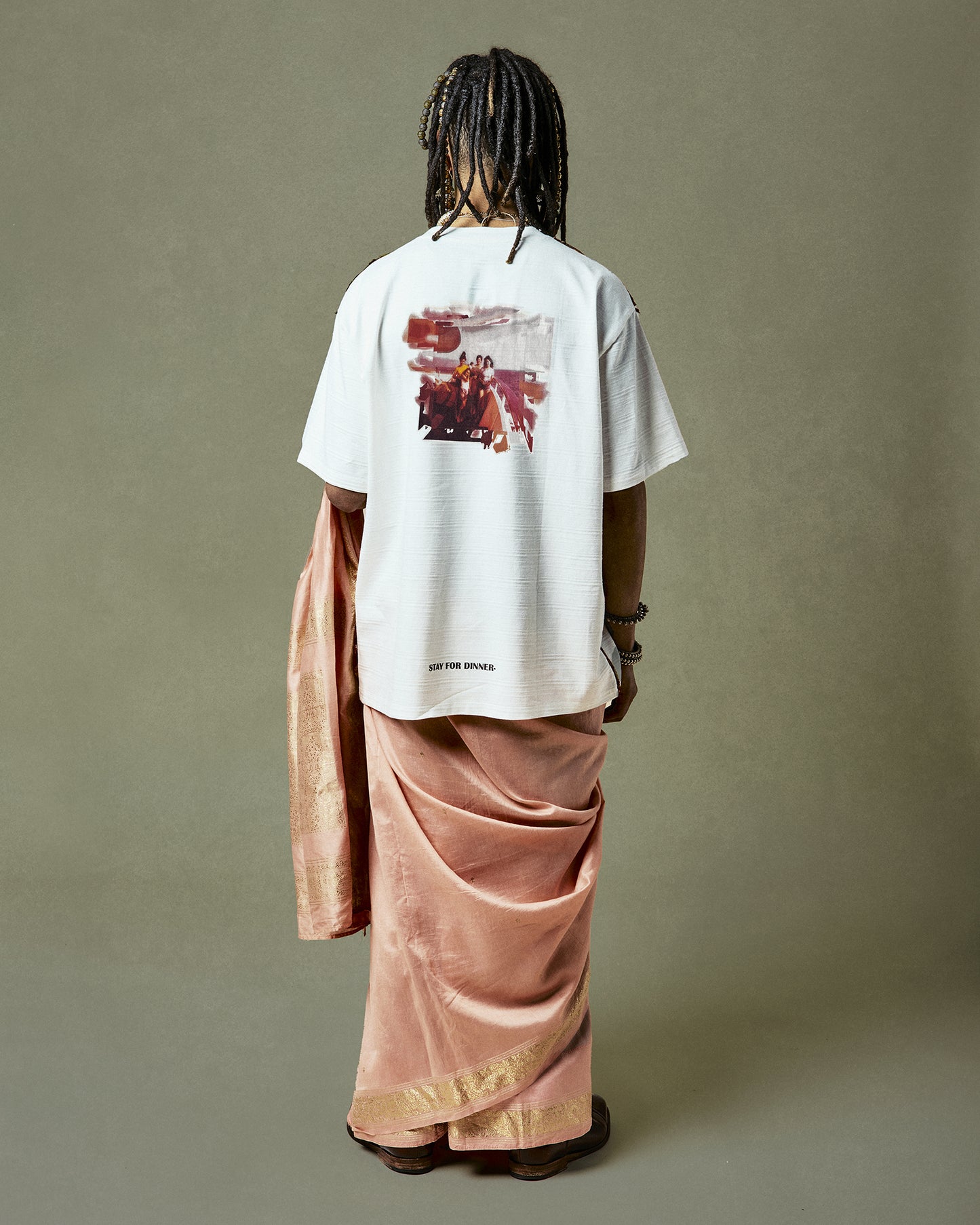 Handmade Quinto T-Shirt showcasing a 1960s polaroid back print and saree trimming seams - a sustainable blend of organic cotton and up-cycled saree fabric, celebrating the 'Calabria-Sicilia' odyssey.